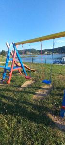 Ο χώρος παιχνιδιού για παιδιά στο Apartman Belisima Deluxe