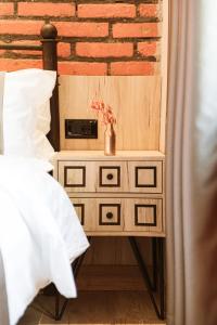 Postel nebo postele na pokoji v ubytování Hotel Taverna Devolli