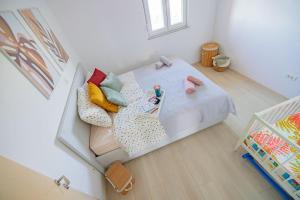 Postel nebo postele na pokoji v ubytování Apartment Vito, Pag Island