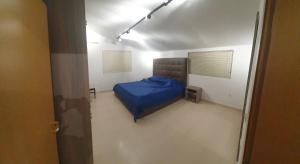 Postel nebo postele na pokoji v ubytování Gruda Apartments