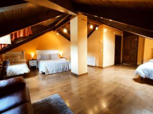 Cama o camas de una habitación en Hotel Rural Pajarapinta