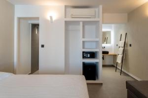 Llit o llits en una habitació de Lofos Village