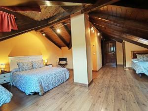 Cama o camas de una habitación en Hotel Rural Pajarapinta