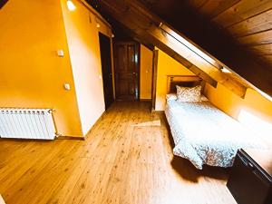 Cama o camas de una habitación en Hotel Rural Pajarapinta