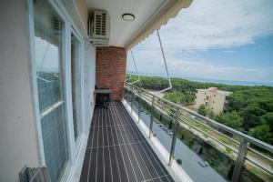 a balcony with a view of the ocean at Sense Luxury Apartments in Velipojë