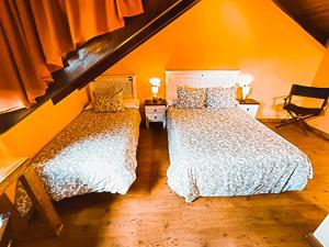 Cama o camas de una habitación en Hotel Rural Pajarapinta