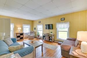 a living room with two couches and a tv at Countryside Hideaway - 10 Mi to Cooperstown! in Westford