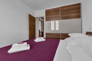 Posteľ alebo postele v izbe v ubytovaní Urban Apartment