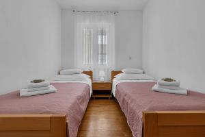 Posteľ alebo postele v izbe v ubytovaní Urban Apartment