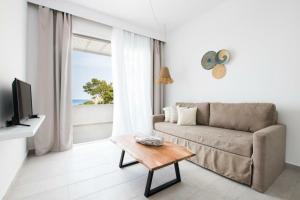 Uma televisão e/ou sistema de entretenimento em Bella vista Suites
