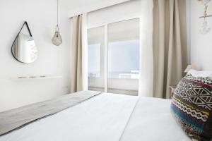 Uma cama ou camas num quarto em Bella vista Suites