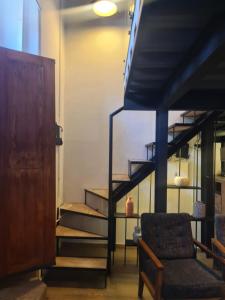 Zona de estar de Loft 41 by Casa Matia