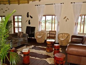 Oleskelutila majoituspaikassa Gondwana Hakusembe River Lodge