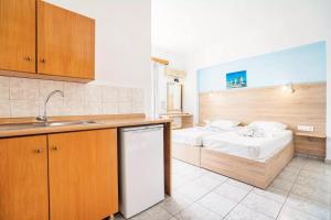Kuchyň nebo kuchyňský kout v ubytování Sotirakis Hotel