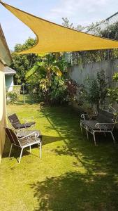 Zahrada ubytování Richmond - Heroes Villa, AC, Security, Access to Pool, Playground & Private Beach - Welcome Breakfast Basket