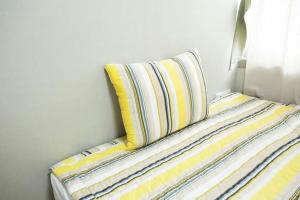 Postel nebo postele na pokoji v ubytování Danaharu Guesthouse