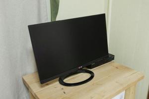 TV a/nebo společenská místnost v ubytování Danaharu Guesthouse