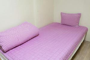 Postel nebo postele na pokoji v ubytování Danaharu Guesthouse