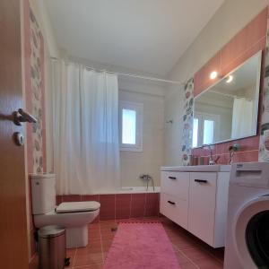 Ванна кімната в Vlasis home