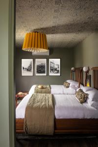 Un pat sau paturi într-o cameră la The Richland