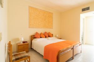 Postel nebo postele na pokoji v ubytování Hotel La Fonte a 300m uscita A14 Pescara Nord + 32 fotografií