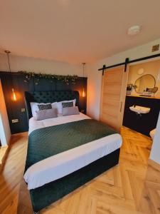 Postel nebo postele na pokoji v ubytování TT Lodges