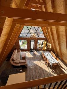 an overhead view of a living room in a log cabin at Qafqaz house in Gabala