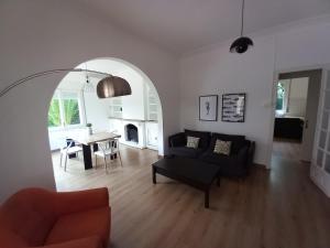 a living room with a couch and a table at Bon Repòs in Cambrils