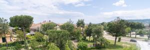 a house with trees in front of a street at Hotel La Fonte a 300m uscita A14 Pescara Nord in Citta' Sant'Angelo