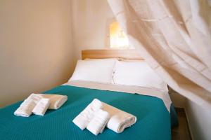 Postel nebo postele na pokoji v ubytování Casetta a due passi - dal CENTRO STORICO
