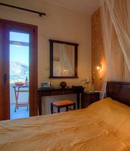 A bed or beds in a room at Elia Meronas