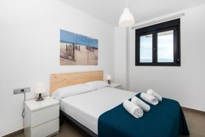 Posteľ alebo postele v izbe v ubytovaní UNIVERSITY & TECH PARK MALAGA APARTMENT + 37 fotografií