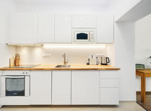 Kuchyň nebo kuchyňský kout v ubytování IMPERIAL Apartments