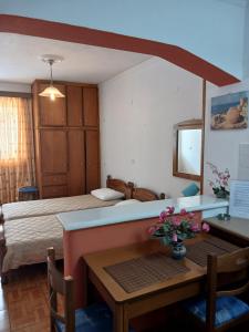 Postel nebo postele na pokoji v ubytování P&G APARTMENTS