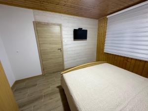 Pejovic apartmani Mojkovac 객실 침대