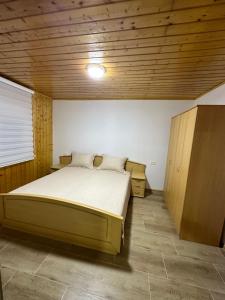 Pejovic apartmani Mojkovac 객실 침대