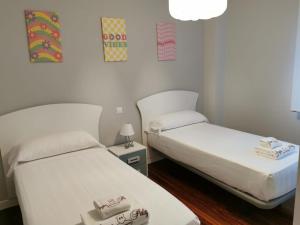 Postel nebo postele na pokoji v ubytování Playa Home Noja