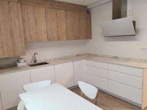 Kuchyň nebo kuchyňský kout v ubytování Playa Home Noja