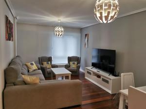 TV a/nebo společenská místnost v ubytování Playa Home Noja