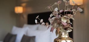 Postel nebo postele na pokoji v ubytování Hotel-Restaurant Jagdhaus Heede