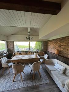 Posezení v ubytování Une-max + 1 fotografie