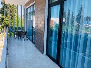 Svalir eða verönd á Apollo Plus Cottages