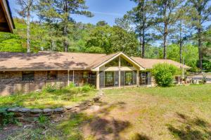 a home in the woods with a large yard at Whimsical Athens Home - 3 Mi to Sanford Stadium in Athens