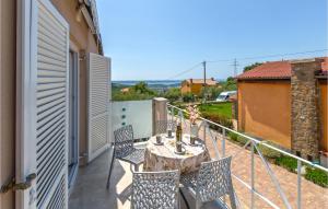 A balcony or terrace at Stunning Apartment In Izola With 1 Bedrooms, Wifi And Outdoor Swimming Pool