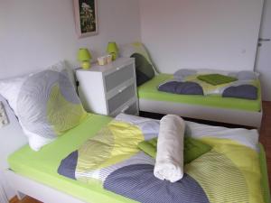 Postel nebo postele na pokoji v ubytování Augusta-Refugium