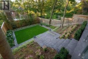 an aerial view of a garden with a lawn at Toronto central area double bed room in Toronto