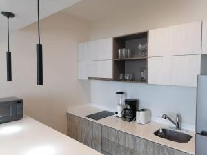 Η κουζίνα ή μικρή κουζίνα στο estrena exclusivo estudio de lujo +5 φωτογραφίες