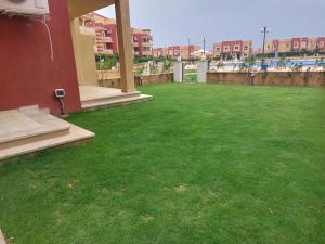 Zahrada ubytování Chalet Rosana Resort الساحل الشمالى