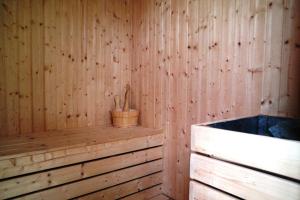 A bed or beds in a room at Hotel Sfera