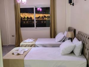 Katil atau katil-katil dalam bilik di Gem Overlooking inn